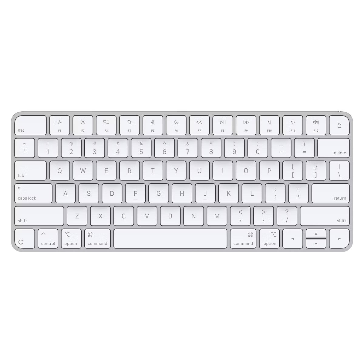 white keyboard that is on table
